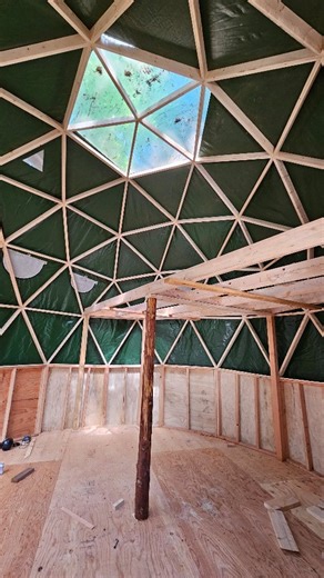Lofty goals on the @bowboybebop cabin dome! Built from our 20'/ 6m plans on a 4' pony wall with the deep frame method. Full 3.5" depth insulation cavity and loooooooots of space in a 300 sq ft footprint. The addition 150 sq ft of the loft will make ot even more spacious 🫡 . Full diy build videos, plans and guides in our bio. . . . #woodworking #cabin #diy #homestead #offgrid #geodesicdome | Trillium Domes