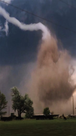 Unreal size... would you chase this tornado? This EF2 near McCook Nebraska spun up one of the largest debris clouds I've ever seen. The tornado caused significant damage to multiple farm buildings. Thankfully, no one was hurt. #Tornado #StormChaser #NebraskaWX #NatureUnleashed #ExtremeWeather | Ricky Forbes