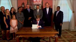 8.4K views · 355 reactions | HISTORIC MOMENT: Tom Llamas reports as Mississippi Gov. Tate Reeves signed a bill officially retiring the state flag – the last state flag to feature the Confederate emblem, with Reeves saying they will find a better symbol “for all Mississippi.” abcn.ws/2Zj3LW0 | ABC World News Tonight with David Muir | Facebook