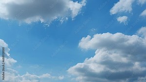 4K : Blue sky timelapse - In a poetic fast time-lapse, the azure sky writes its story with swiftly shifting clouds, creating verses of wonder and beauty in every frame. Autumn sky background.