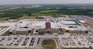 Our Project of the Quarter is Prosper ISD's Walnut Grove High School, designed by Huckabee. The 530,000 SF building comes complete with an auditorium, sports arena, 62 core classrooms, and 14 science labs. Walnut Grove will also include specific areas for various career fields like business, fashion, and robotics. However, building this school did not come easy. One of the challenges our project team faced was that the school only had one access point via a one-lane road on First Street. Despite
