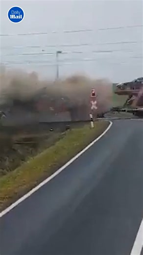 The driver jumped to safety just seconds before it hit 😳 | Daily Mail Video