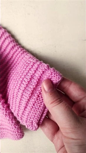 Beautiful and easy to knit baby cardigan. Polli Baby Cardigan Knitting Pattern.
