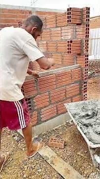See how a professional bricklayer works daily building houses.