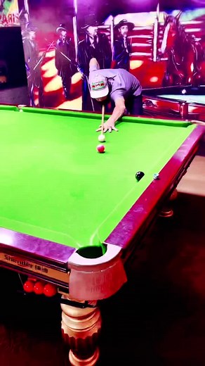 Exciting Pool Gameplay with Colorful Cowboy Murals