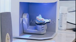 Scanning a denture in a dental laboratory to reproduce the patient's oral anatomy. Dental equipment, laboratory scanner system