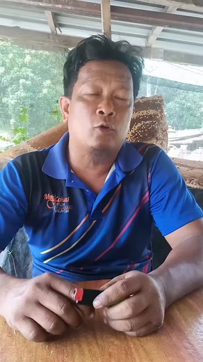 Interacting with a Unique Lighter in a Rustic Setting