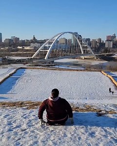 Bombs away! 🛷 What's better than tobogganing down the last of the winter snow? Getting to overlook the stunning Walterdale Bridge on the way! 😊👏🏼 🎥: yegventures via Instagram 📍: Queen Elizabeth Hill, Explore Edmonton, Travel Alberta | Canada Keep Exploring