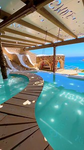 @juliagal_ basks in a tranquil and scenic day in Ios, Greece. 😌✨ Offering something for everyone, this laid-back Greek island is home to beaches, hiking trails, ancient runs, serene accommodations, a vibrant night life, and an atmospheric dining scene. 🇬🇷 How does a vacation here sound? 🌊 📽 @juliagal_ 📍 Ios, Greece 🎶 Lucas Estrada, TWOPILOTS - Bloom | Beautiful Destinations