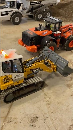 RC Track loader with a quick coupler is only 2300 dollars