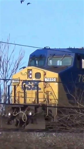 CSX Dash 8 unit passes old CSX GP30 engine