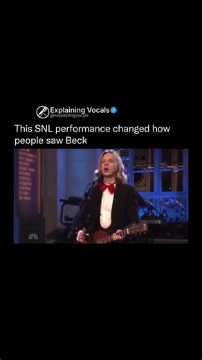 Explaining Vocals on Instagram: "Beck’s 2006 appearance on Saturday Night Live has become one of those performances that lives permanently in people’s memory, not because it relied on spectacle, but because it felt unmistakably him. For many viewers, it served as an introduction to Beck’s world, a blend of humor, experimentation, and understated musicality that didn’t feel scaled down for television, but perfectly adapted to it. At a time when many artists simplified their visuals for broadcast,