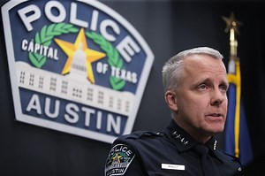 Amid budget cuts, police chief proposes slashing units, reassigning officers to patrol