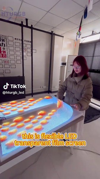 This is flexible LED transparent film screen 3mm ultra-thin design Transparency 90% No structure required Paste glass installation Turn on the power to play the video #ledtransparentfilm #leddisplay #SmartLED #HTURGBFILM #HTURGB
