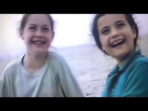 Sesame Street letter u on the beach