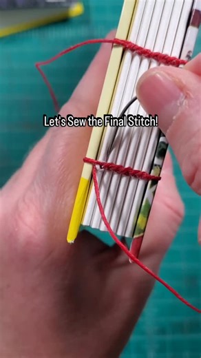 Lacy Stoneburner | Bookbinder on Instagram: "Putting the final stitch in a Nancy Drew Journal 🪡 #copticbinding #bookbinding #vintagebooks #copticstitch #bookartist"