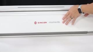 Watch Emily Steffen use the Singer Momento craft cutting machine to create a felt wreath. The Momento quickly and accurately cuts any shape, so you don't need to even pick up your scissors. Emily uses the Momento to cut out different colors and sizes of leaf shapes from felt, then hot glues them to a wooden hoop to create a wreath for fall decor. #sponsored Singer North America | Craftsy