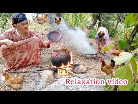 A strong Amazigh woman, living in the countryside, cooking the most delicious traditional meal