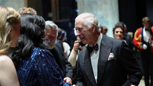 King applauded on Royal Opera House stage hand in hand with performers