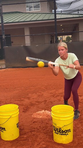 A bunting drill from my latest YouTube video Set up two buckets third base lane and first base lane and aim for the buckets. The goal is to let the ball travel and to make contact more on top of the ball so the ball drops straight down and dies.