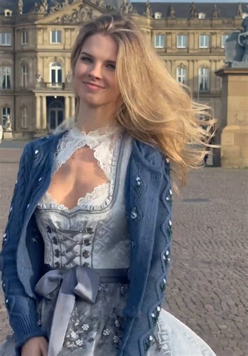 Traditional German Dirndl Dress Showcased in Historic Location
