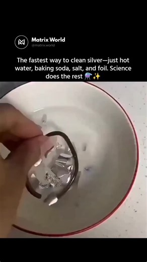 Matrix World on Instagram: "Silver can be cleaned using hot water, baking soda, salt, and aluminum foil because the setup creates a small electrochemical reaction. Tarnish on silver is mainly silver sulfide, which forms when silver reacts with sulfur in the air. Aluminum is more reactive than silver, so when both metals are placed together in hot, salty baking-soda water, electrons flow from the aluminum to the silver. This electron transfer breaks the bond between silver and sulfur, turning sil