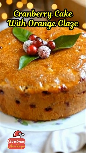 ⭐CRANBERRY CAKE WITH ORANGE GLAZE – DON’T LOSE THIS RECIPE⭐ A warm Southern Christmas cake kissed with winter citrus light ⭐ Golden Tip (Using seasonal Southern fruits at the right time brings out their sweetest, richest flavor—enjoy the winter harvest while it’s here.) Some cakes feel like a December morning in a grandmother’s kitchen—soft golden crumb, ruby cranberries glowing through the sides, and the gentle shine of fresh orange glaze warming the room. This Cranberry Cake with Orange Glaze 