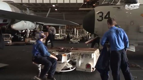 A day in life of an Aircraft Carrier Hangar in Middle of the Ocean