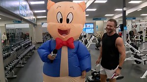 Casey Scott dresses as Porky Pig for a Halloween gas card giveaway