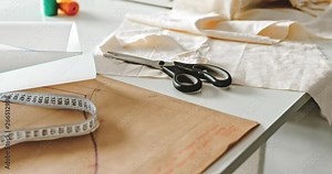 Fashion designer desk with equipment, tailoring and sewing workshop concept