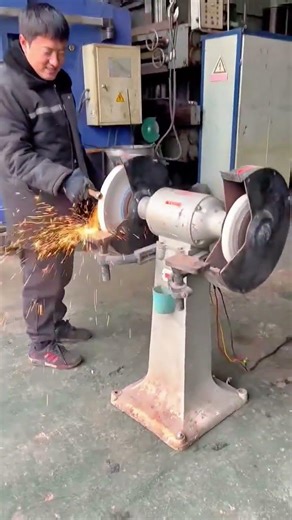 Metal Grinding in a Machine Shop Sparks and Industrial Equipment