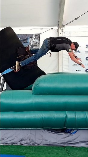 Flying off of the Landsafe bucking horse to demonstrate air vests use provided by Ride EquiSafe!