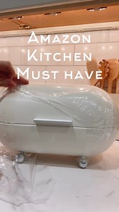 2.2M views · 7.8K reactions | https://urlgeni.us/amzn/Breadboxphoto Sleek, modern breadbox holds all your pastries, breads and more while keeping countertops clutter free. Keep food items fresh while adding beauty and style. Can also be used to hold makeup and toiletries in bathroom or on vanity. Enjoy ~ Julie #amazonhome #amazonfinds #amazonmusthaves #founditonamazon #KitchenEssentials #amazonfavorites | The Design Twins | Facebook