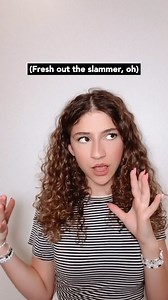 Back from my social media break and feeling fresh out of the slammer (in sign language, of course!) Here’s my ASL cover of “Fresh Out of the Slammer” by Taylor Swift! 🎶 - @taylorswift Bracelets: @busbeads VD: Savannah has medium length curly hair. In a white and black striped shirt, she’s signing “Fresh Out The Slammer” by Taylor Swift in front of an off white background. #SavvyASL #deaf #girlpower #empowerment #deafculture #representation #music#taylorswift #americansignlanguage #aslperformer 