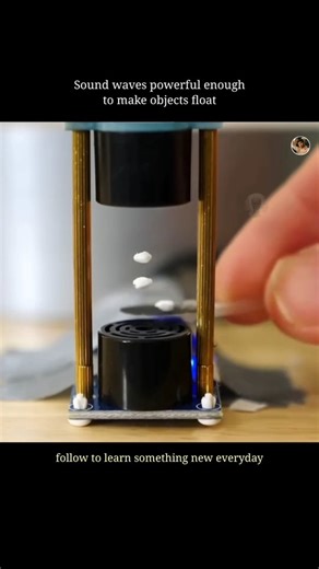 Ai Ayush on Instagram: "This is acoustic levitation 🔊✨ It works using sound waves. High-frequency sound forms standing waves with pressure nodes, creating an upward acoustic force. Tiny objects get trapped at these nodes, where sound pressure perfectly balances gravity—making them float in mid-air. Science that looks like magic! #acousticlevitation #soundwaves #scienceexplained #physics #levitation standingwaves techmagic sciencefacts futuretech mindblown"