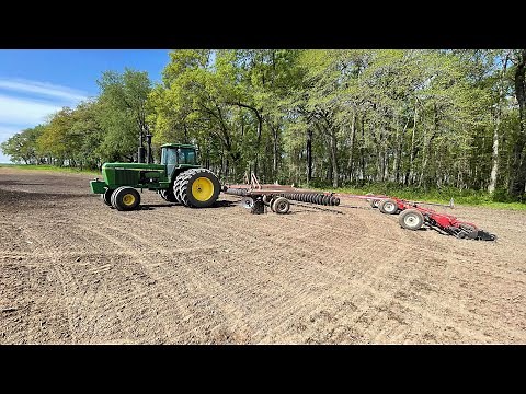 John Deere 4840 working ground.