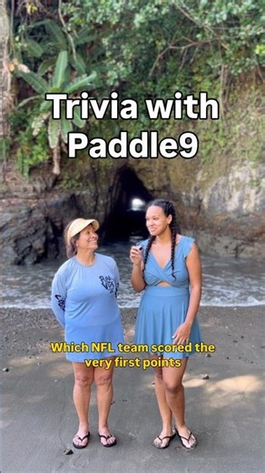 Ladies play trivia in front of lava tube caves at a Costa Rican beach | Manuel Antonio, Costa Rica