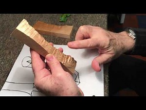 Where does the "flame" effect come from on the back of a violin?