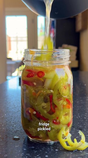 🌶️10-Minute Fridge Pickled Peppers💨 Light that booty up with these snapping quick pickled peppers. They’re ready to eat after 10 minutes and you only need the first 4 ingredients (we added more peppers because we like them). These peppers are a perfect addition to breakfast burritos, tacos, burgers, or just eat them out of the jar. You can leave out the habanero if it’s too spicy, but the heat calms down after they pickle. If you love garlic, just make a whole jar of pickled garlic! Ingredient