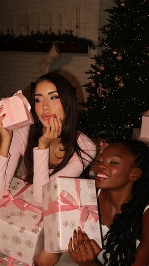 Glamnetic on Instagram: "These might be the prettiest holiday nails we’ve ever launched 💅✨ Meet Ruby Ribbons, a ruby red french tip decorated in pearl accents and topped with a white 3D bow nail charm. She’s elegant, festive, and everything a holiday mani should be 🎀 Launching tomorrow 10 AM"