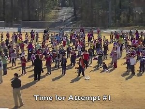 Largest Group Of People Playing Paddle Ball At Once