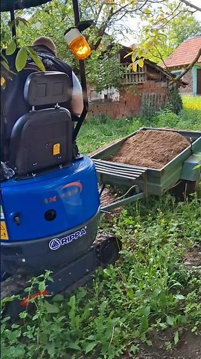 Mini excavator with trailer