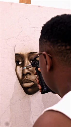 This artist paints with fire 😮 @alexpeter_idoko uses a mix of fire, sandpaper, razors and acrylic, his self-developed style, pyro-fusionism, blends hyperreal detail with surreal emotion - telling stories that linger long after you look away. Definitely one to follow 👀 #art #pyrography #pyrofusion #hyperrealism #contemporaryart #viralart | Magnum Tattoo Supplies Ltd