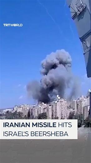CCTV footage shows an Iranian missile hitting Beersheba, Israel, amid escalating tensions. Israeli emergency services reported up to 19 people lightly injured as exchanges of strikes between Iran and Israel enter a third day. | TRT World