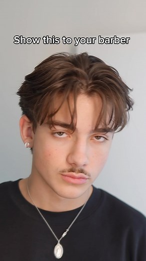 Elijah Forcier on Instagram: "Use this if you want a Middle Part✨ Make sure your show the video to your barber so you can get the right haircut ✅ also the products I use are in bio with discount code ELIJAH 🤝 . . . . . #haircut #hairstyle #hairideas #hairtransformation #barber #hairtrends #mensgrooming #hair"