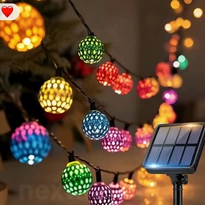 Light up your nights with Moroccan dreams! 🌙 These solar-powered string lights bring a touch of exotic magic to your garden, glowing with vibrant colors at dusk. Link in comments! 👇 | Next Deal Shop
