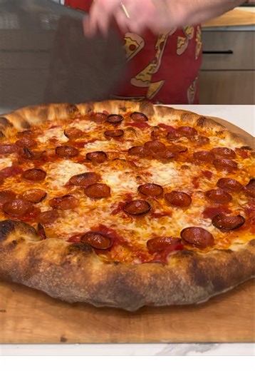 My favorite way to make a pepperoni pizza (currently). Made with @King Arthur Baking bread flour, Ezzo Pepperoni and @Bianco DiNapoli tomatoes. Baked on the @Baking Steel Company at 550° for 8 minutes. #pizza #asmr