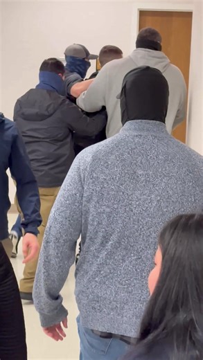 ICE agents detain an illegal immigrant immediately outside the doors of immigration court in NYC. The illegal alien resists but is overpowered by the agents. His girlfriend watches on, crying and banging on the doors he’s led into. I voted for this. One of you guys might want to get her number now that she is single. | Revenge of the Smirk