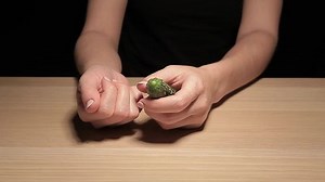 woman hand cucumber pill table