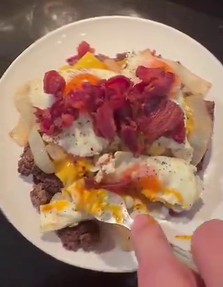 This made my mouth water just as much as any steak ever has. It’s a pound of ground beef, sautéed onions, 3 eggs, 3 slices Sargento American cheese and bacon crumbles.